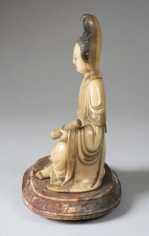 Seated Guanyin Holding a Scroll