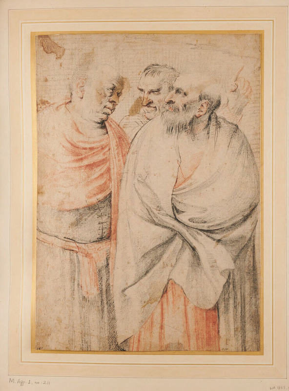 Three men in conversation