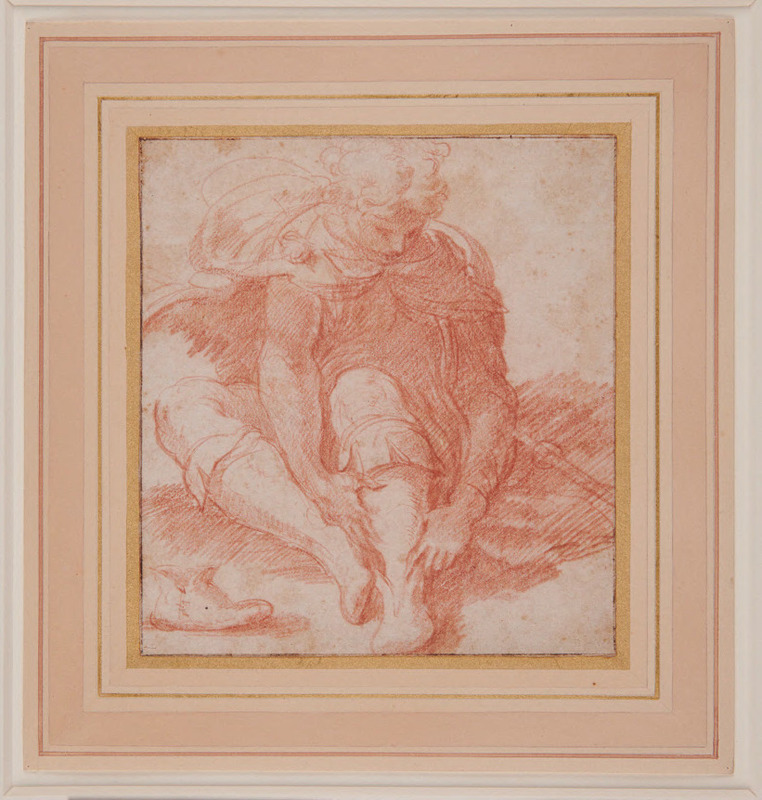Young pilgrim seated on the ground