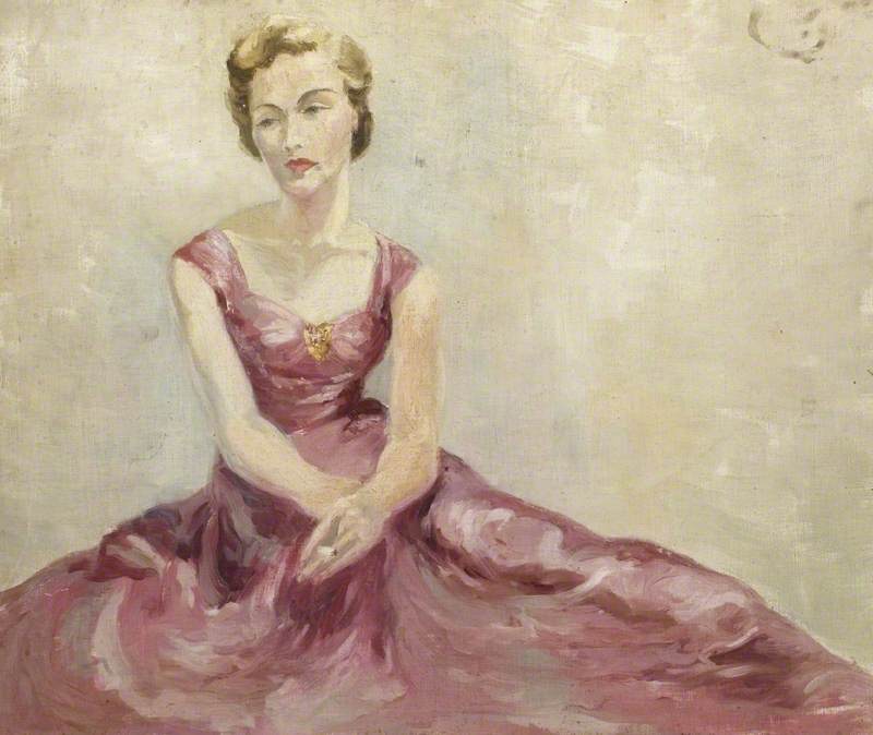 Portrait of a Young Woman with Blonde Hair in a Pink 1950s-Style Dress