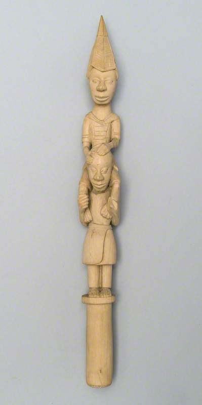 Carving of Two Figures