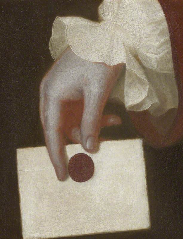 A Hand Holding a Letter