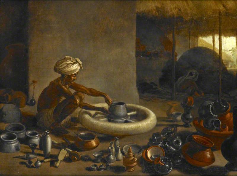 Potter Engaged in Throwing a Pot on a Wheel