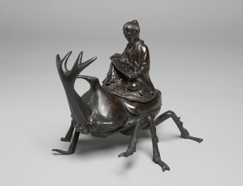 Okimono of a Chinese Sage or the Deity Jurojin Riding a Rhinoceros Beetle