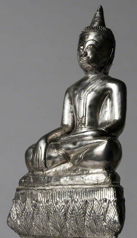 A Buddha on Shaped Pedestal Base