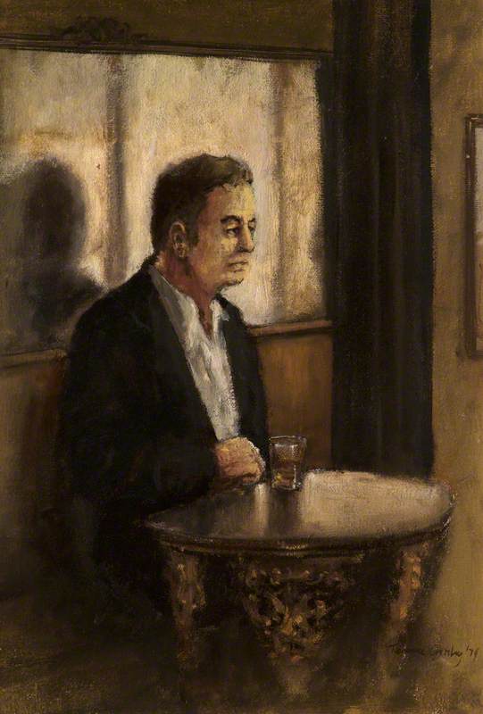 Man Sitting in a Pub