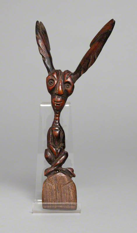 Stylised Figure Seated Cross-Legged with Large Ears