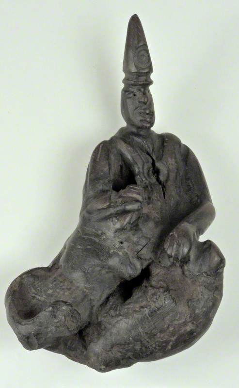Seated Figure with Robe and Pointed Hat