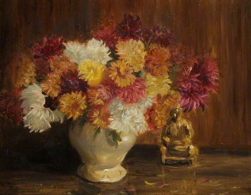 Dahlias in a Ceramic Vase with a Buddha Figure