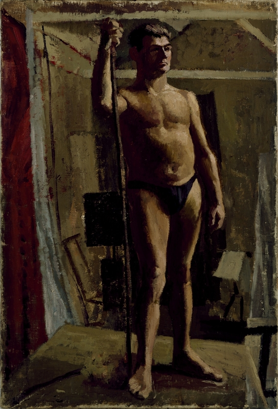 Male Figure Standing Holding a Staff