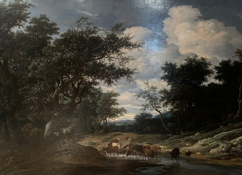 A Wooded River Landscape with Cattle