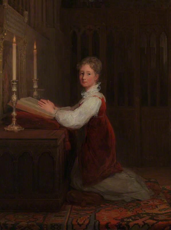 A Young Woman Kneeling at a Prayer Desk