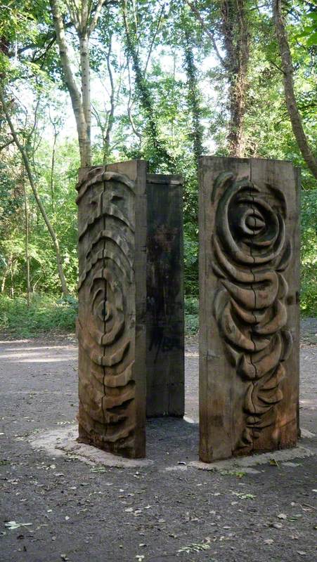 Four Carved Wooden Standing Boards