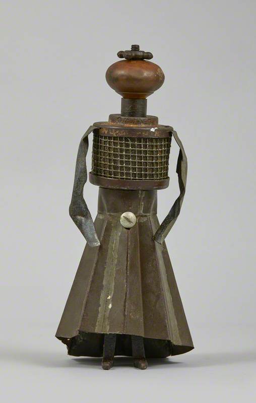 Metal Junk Sculpture: Woman with Fluted Skirt