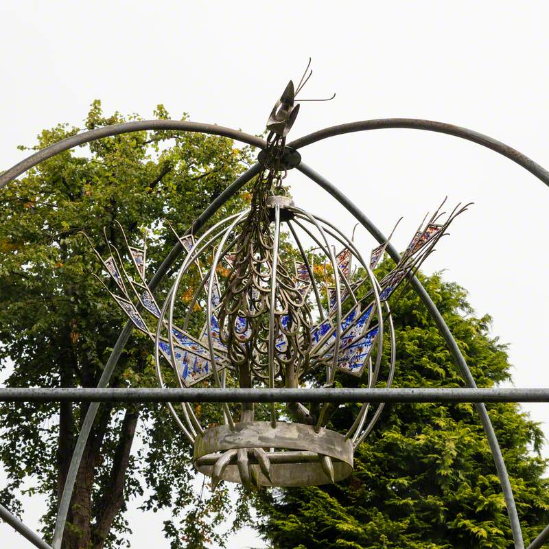 Caged Peacock