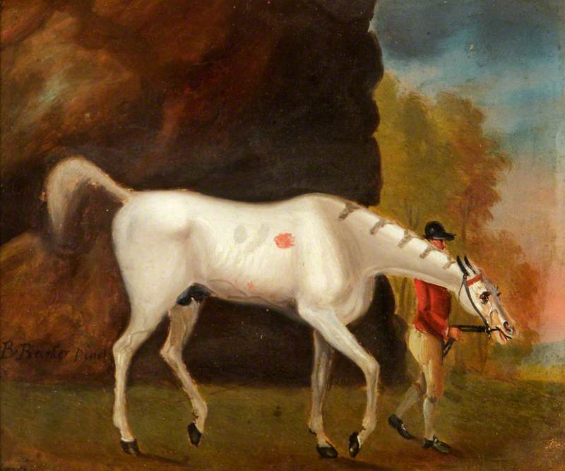 A Jockey in a Red Jacket Leading a Grey Horse