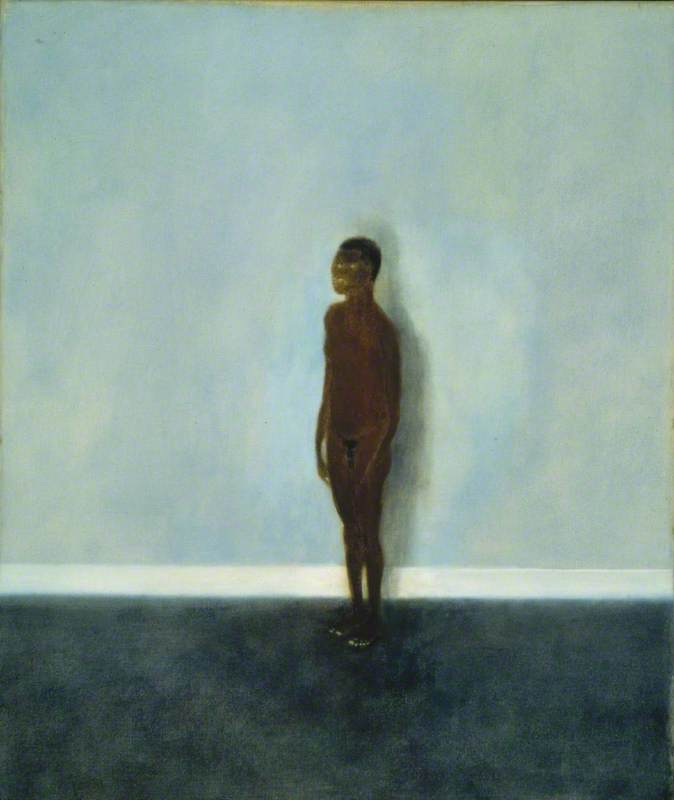 Model Standing against Blue Wall