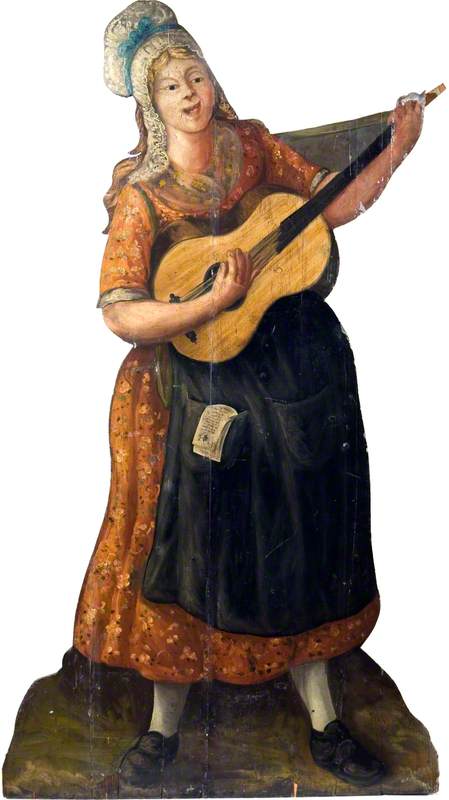 Female Street Player with a Guitar