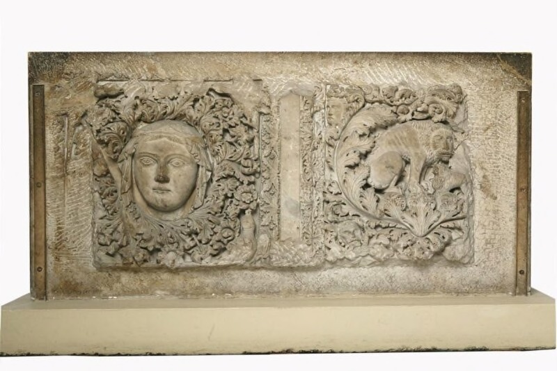 Relief with Female Head and Lion and Cub in Foliage