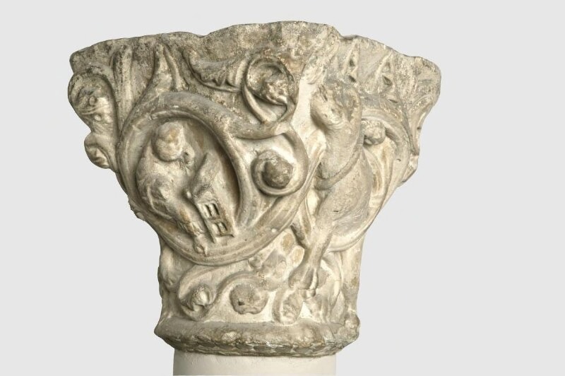 Capital with Lions and Reading Monks in Foliage