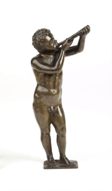 A Boy Blowing a Trumpet