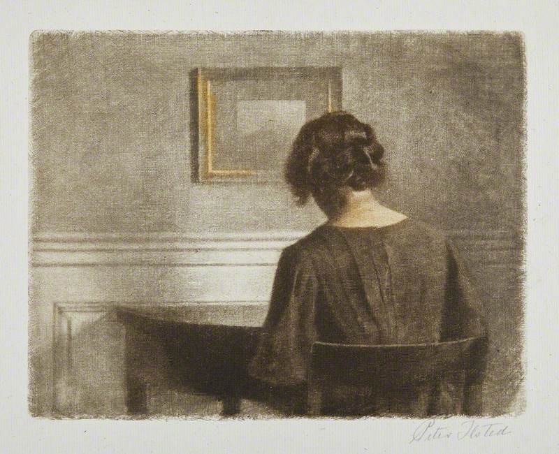 Girl Sitting at a Table