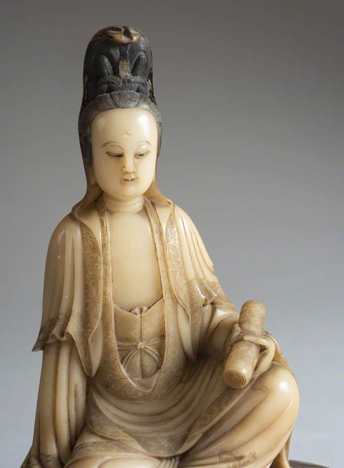 Seated Guanyin Holding a Scroll