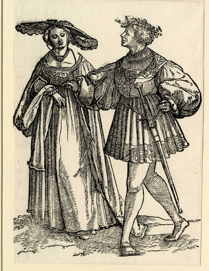 Couple walking to the left