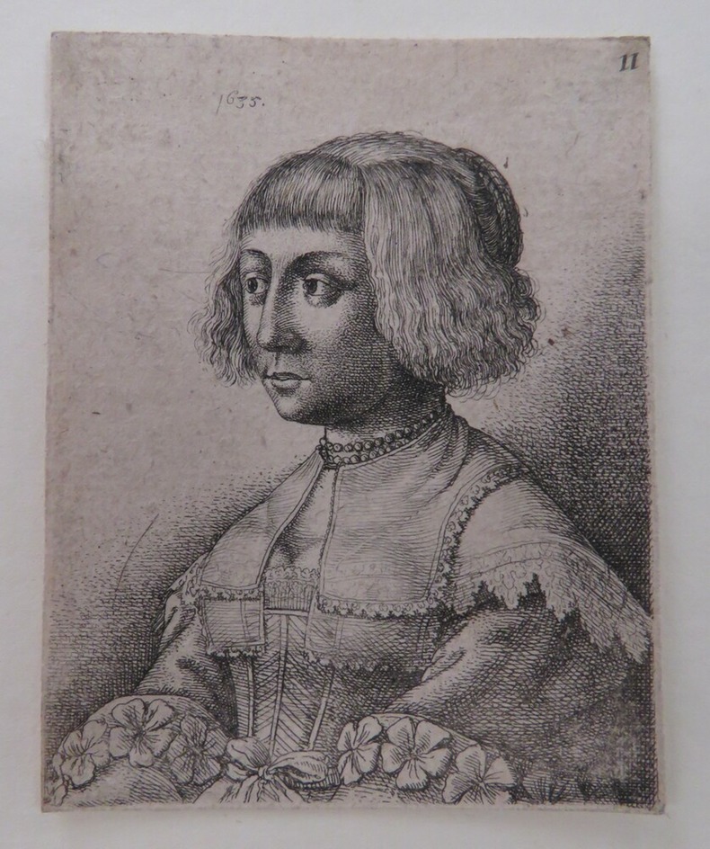 Young woman with rosettes on her sleeves