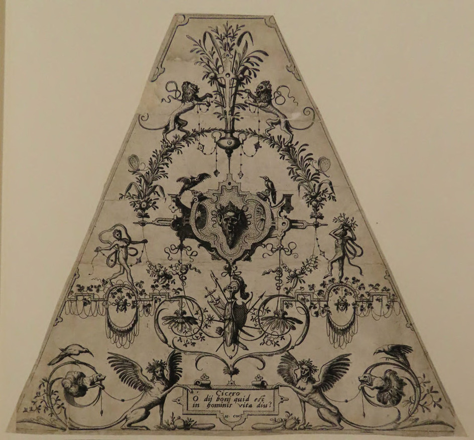 A mask in a cartouche at centre, two sirens below, with a quote by Cicero, from Douce Ornament Prints Album II
