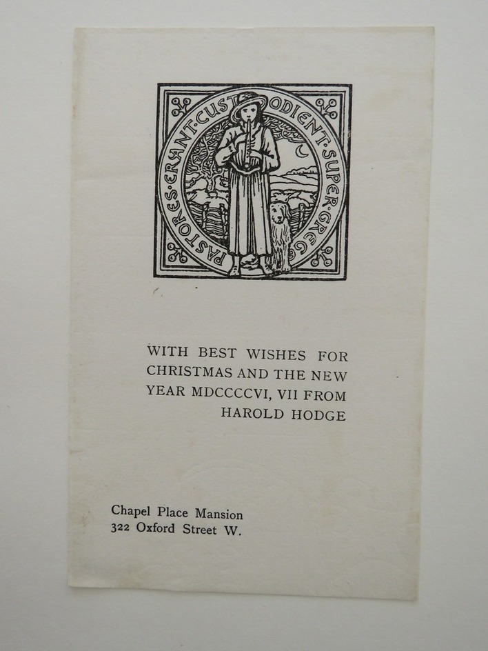 Christmas card for Harold Hodge, 1906: shepherd playing pipe with sheepdog and pen of sheep