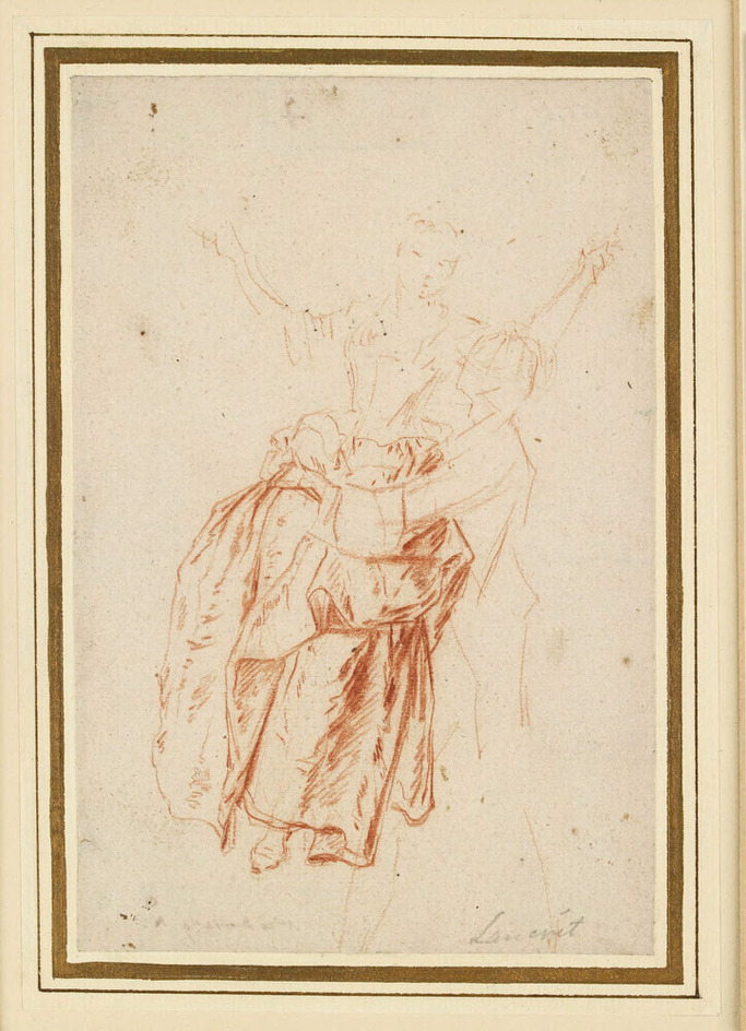 A girl on a swing, assisted by a young man