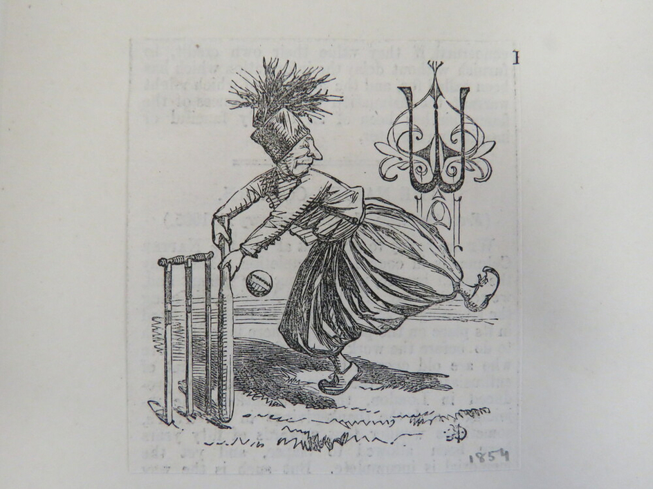 Figure with cricket bat and headdress, standing in front of cricket stumps