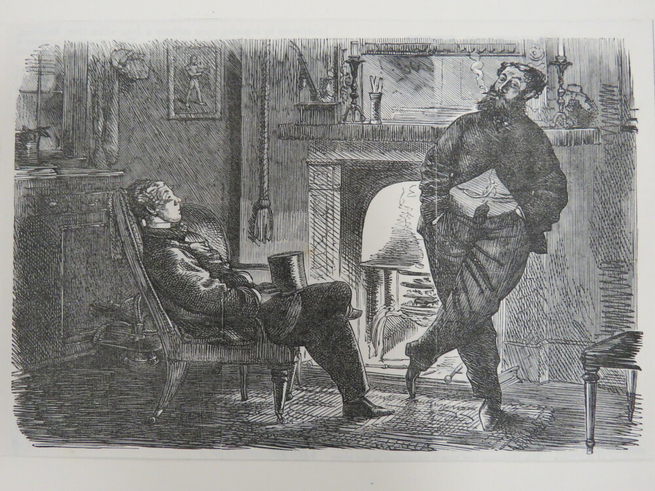 Two men in conversation in front of fire