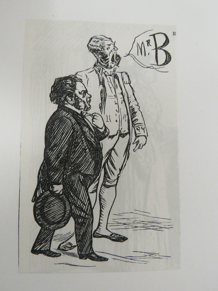 Two men in suits walking side by side, one calling out the name 'Mr. B'