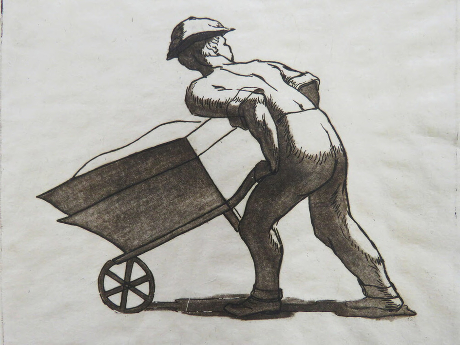 Man pushing wheelbarrow