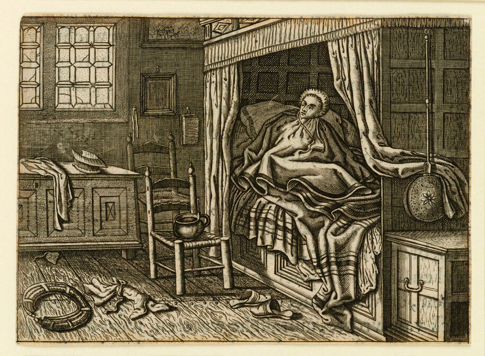 A woman sitting up in bed