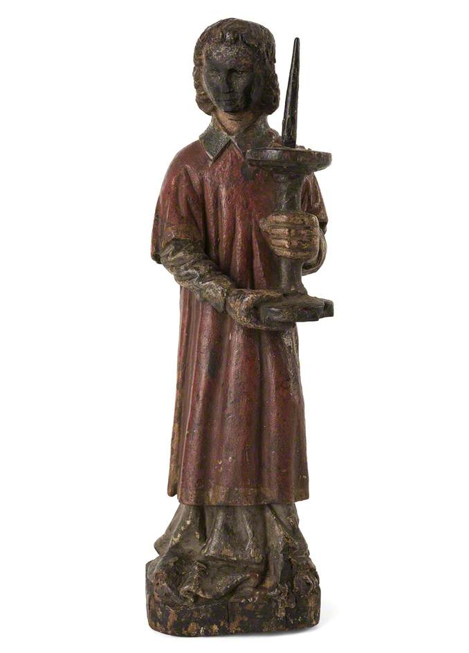 Carving of a Deacon*