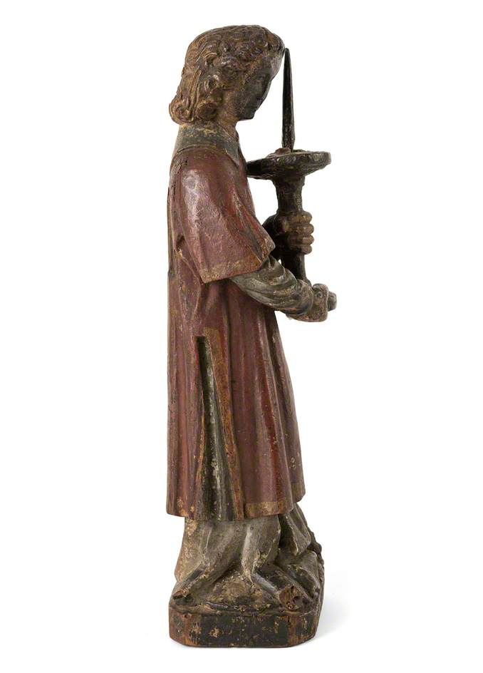 Carving of a Deacon*