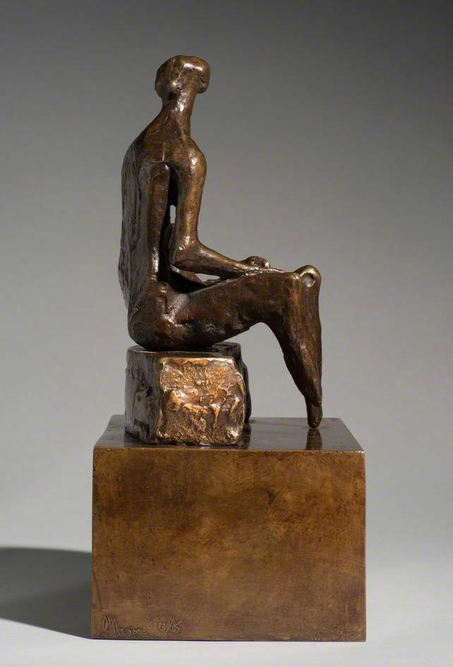 Seated Woman on Curved Block
