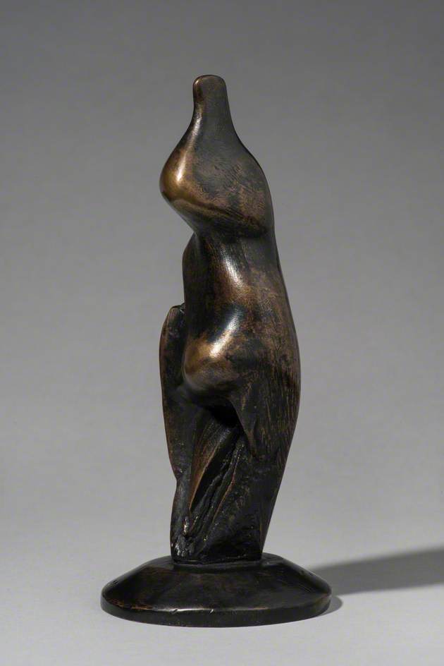 Standing Figure on Round Base