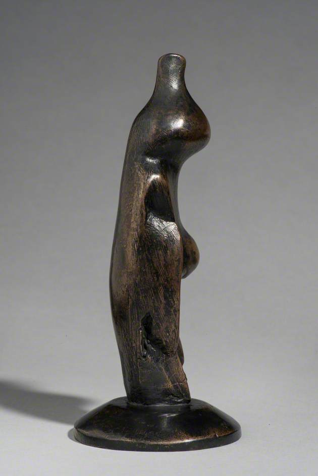Standing Figure on Round Base