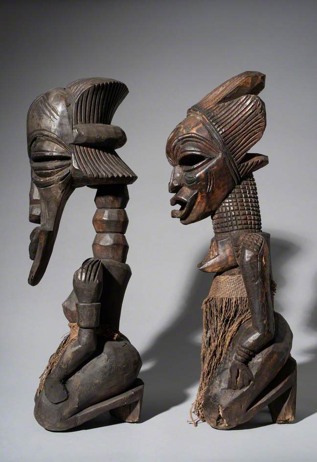 Pair of Traditional Sculptures of a Male and Female