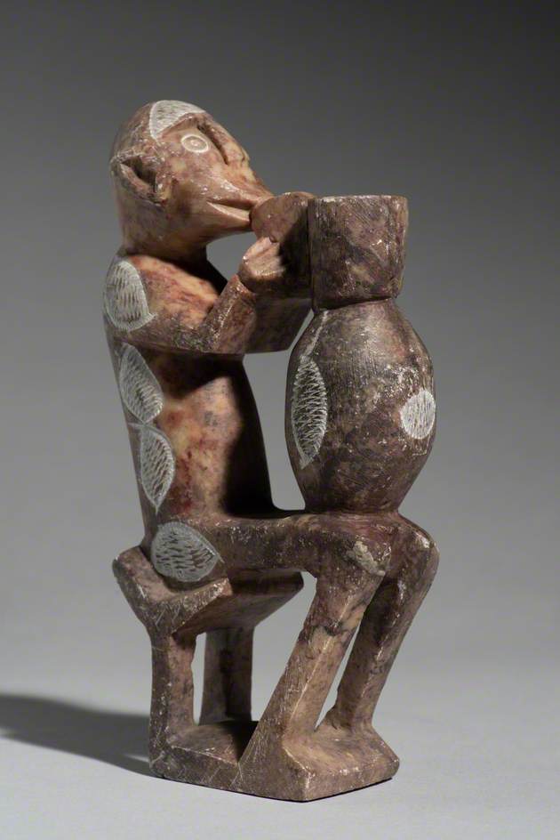 Figure of a Seated Man with a Pot