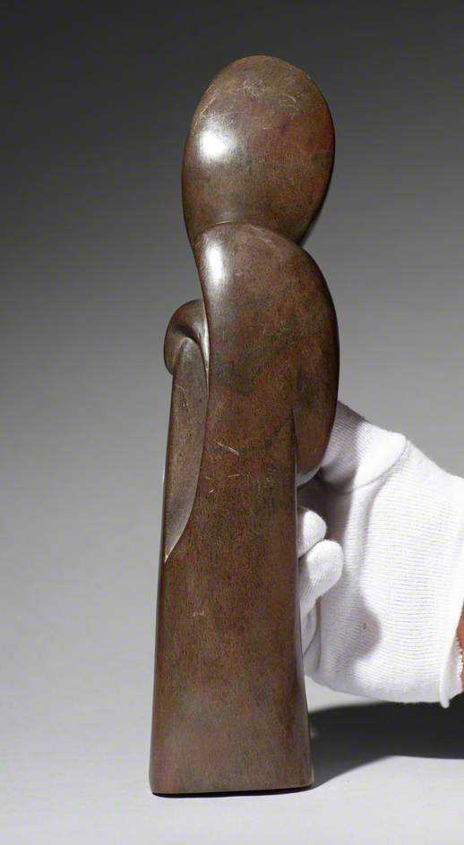 Abstract Shona Sculpture with a Figure with a Vase