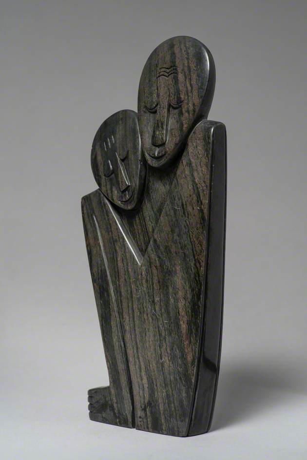 Shona Sculpture with Two Smiling Faces