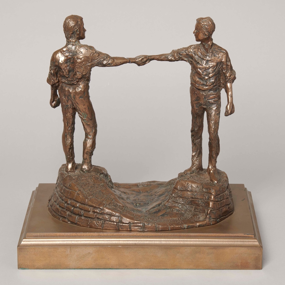 Two Figures Shaking Hands