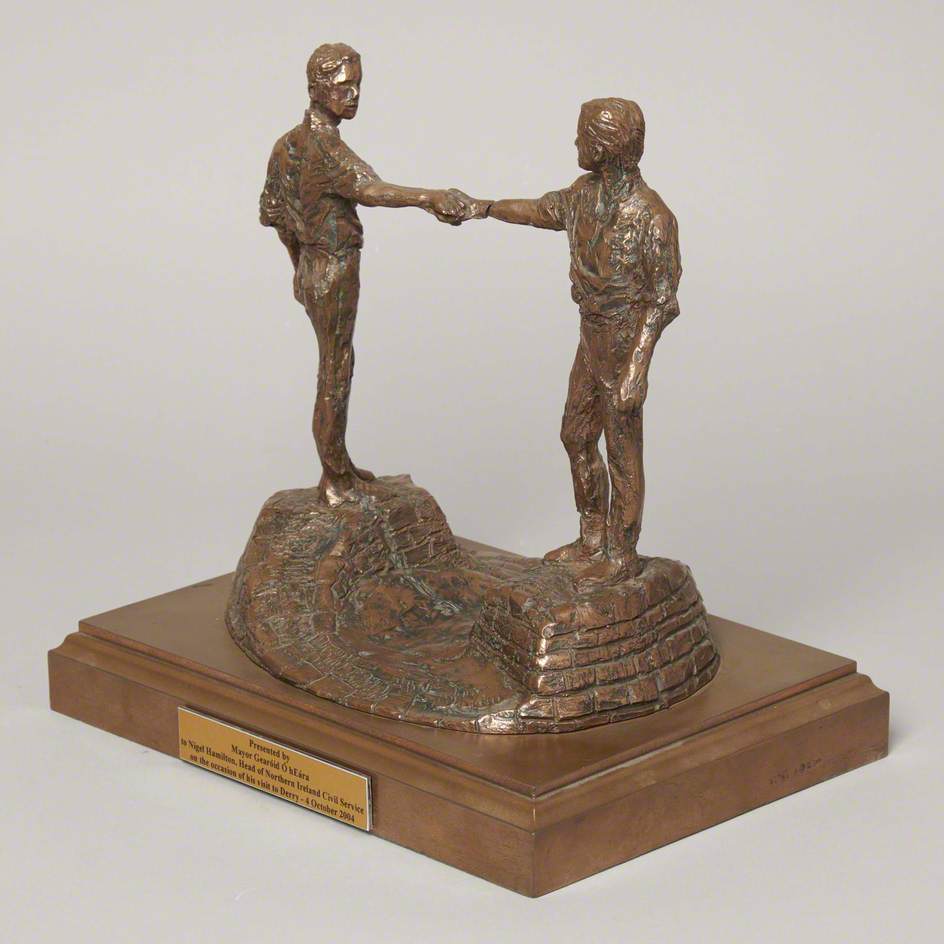 Two Figures Shaking Hands