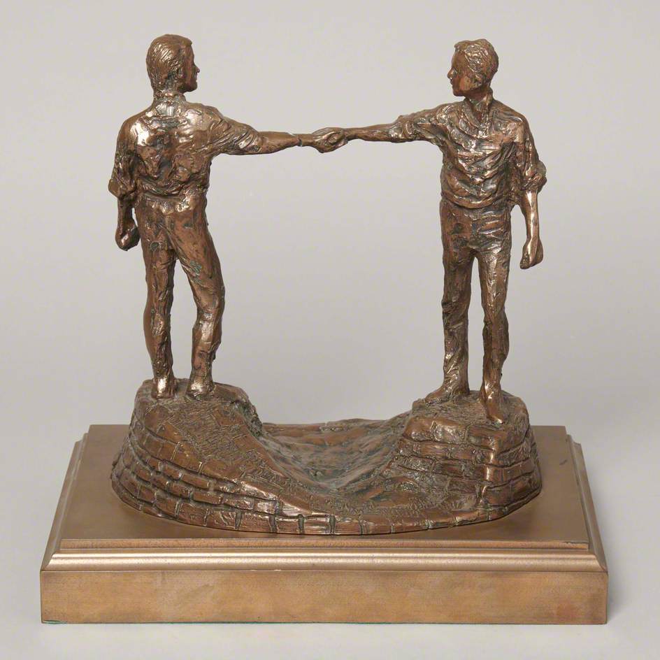 Two Figures Shaking Hands