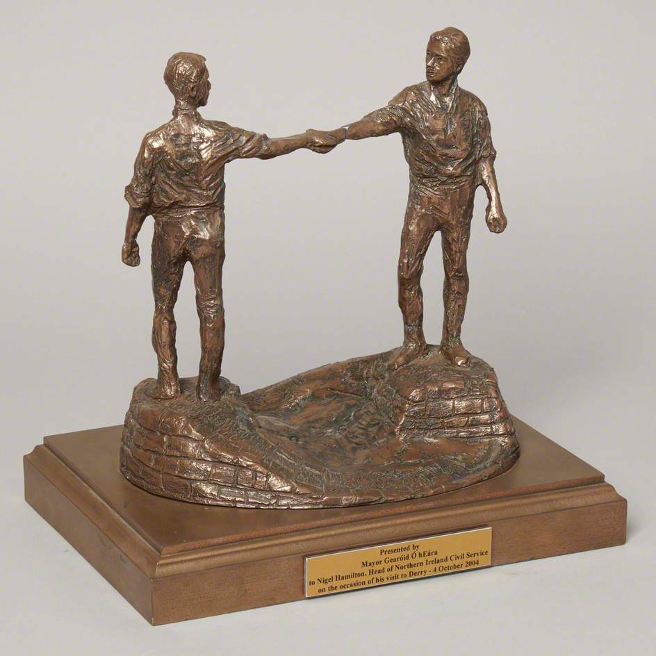 Two Figures Shaking Hands